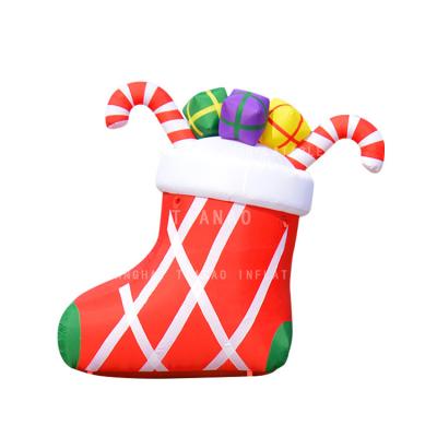 China Xmas Inflatable Kickstand Boots Holiday Decoration Inflatable Christmas Snowman for sale