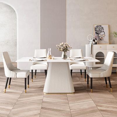 China Customizable New Material Italian New Design Rock Dining Tables With Chairs Modern Dining Room Furniture for sale