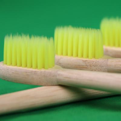 China Best New Designed Hotel Bamboo Toothbrush Selling Yellow Adult Bamboo Toothbrush for sale