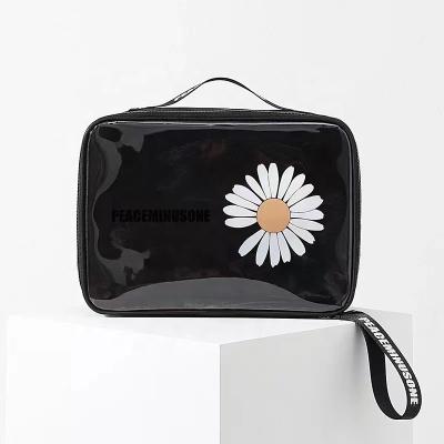 China New Fashion Large Daisy Cosmetic Bag Portable Cosmetic Storage Bag Travel With Clear PVC Toiletries Bag for sale