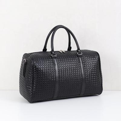 China New Fashion Multifunctional Woven Handheld Travel Bags PU Leather Men And Women Waterproof Large Luggage Bags Weekend Travel Bags for sale