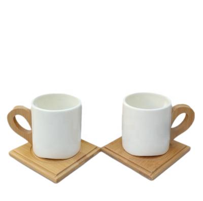 China Healthy White Empty Ceramic Wooden Bamboo Tea Cups Stored 180ml Coffee Cup Saucer With Gift Packing for sale