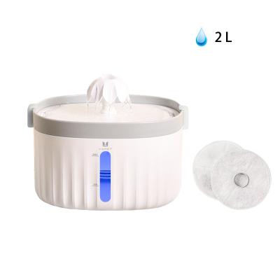 China Automatic hot sale non slip automatic smart electric battery-powered pet fountain dog drinker cat drinking dispenser 2L white ABS for sale