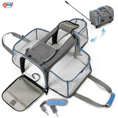 China Small Animals Stock Storage Quickly Deliver Pet Rolling Carrier, Airline Approved Dog Carrier2 Sides Expandable and Folding Portable Removeable Wheels for sale