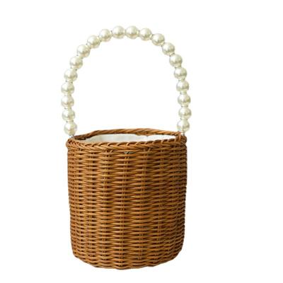 China Tidy up/storage a cute little basket of children's toys and props and gifts and handwoven wicker bead bracelet handle storage basket for sale