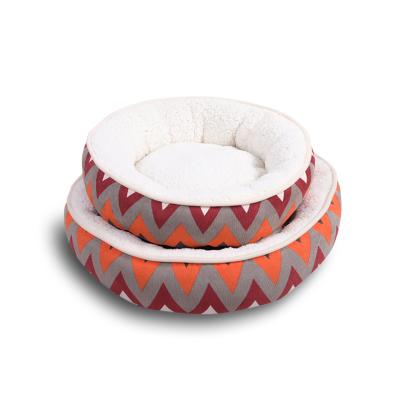 China Waterproof Comfortable Donut Around Washable Faux Fur Dog Bed Pet Cushion Luxury Vivid Pet Bed for sale