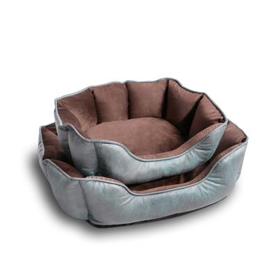 China Shell Oval Snuggle Bed Leather Cat Bed Felt Donut Zip Waterproof Luxury Indoor Pet Beds for Cats for sale