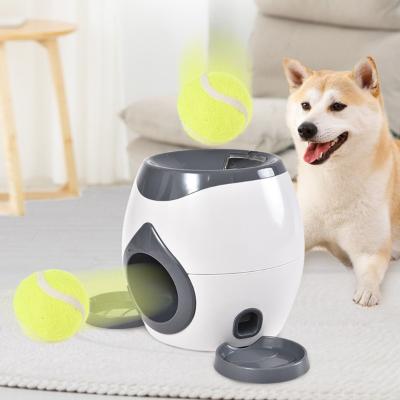 China Stocked Tureda Pet Ball Throw Toy Dog Tennis Leaked Food Reward Machine Thrower Slow Feeder for large dogs Interactive Supplies for sale