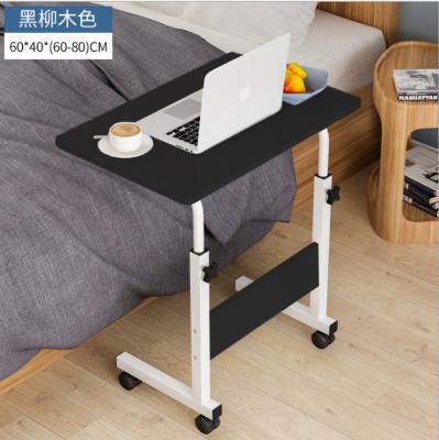 China New Foldable Wooden Laptop Desk With Wheel Lift Table Bedroom Learning Table for sale