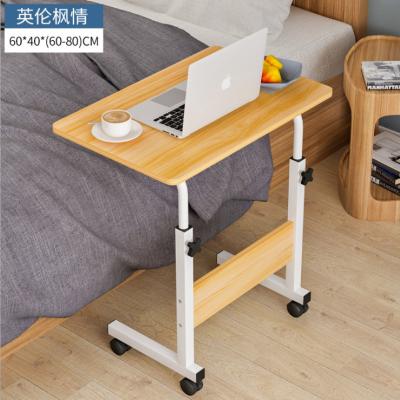 China Manufacturer direct selling foldable wooden laptop desk with wheel lifting table bedroom learning table for sale