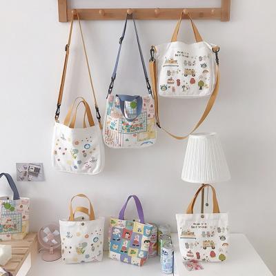 China High Quality Custom Canvas Bag Women Student Cute Japanese Printed Wild Green Shopping Bag Cloth Small Portable Handbags for sale