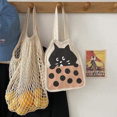 China 2022 High Quality Cute Cartoon Amazed Cat Lunch Box Student Storage Bag Lady Bags Handbag Canvas Universal Shopping Shoulder Bag for sale