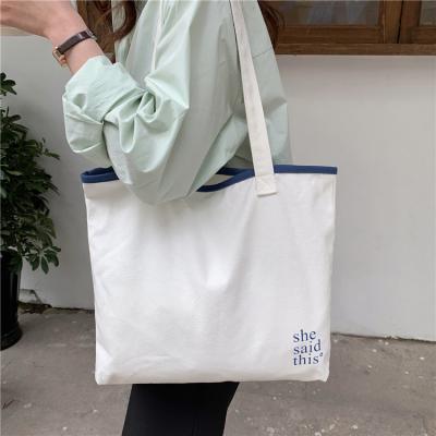 China New arrival high quality simple English alphabet printing white and blue quilted hand Carry One Shoulder Bag leisure bag for ladies for sale