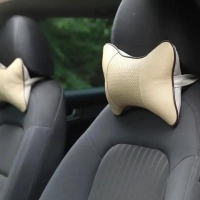 China Protect Neck Comfortable Car Neck Rests Both Side PU Pack Leather Headrest For Head Pain Relief Filled Universal Fiber Car Pillow for sale