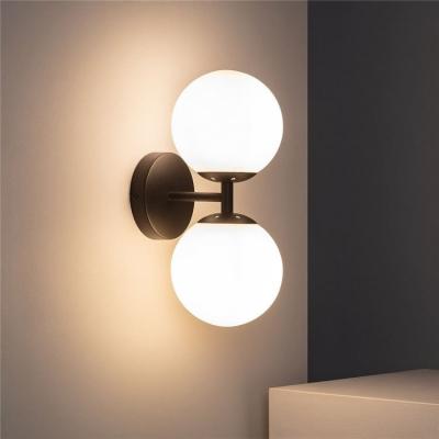 China Beautiful 2022 Nordic New Design Postmodern Glass Ball Bedsides Iron E27 Wall Lamps For Hotel Home Decorative for sale