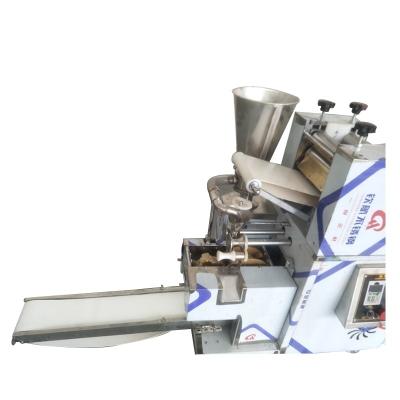 China Hotels Model 130 Stainless Steel Automatic 110/220V Dumpling Maker Gyoza Maker Dumpling Making Machine for sale