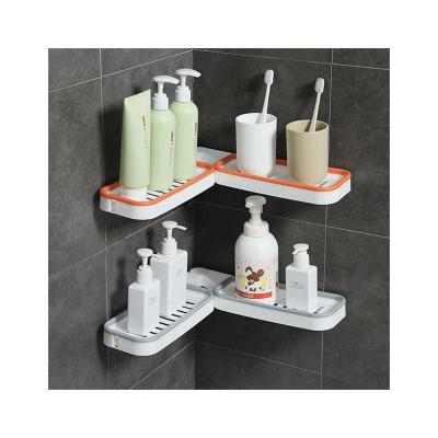 China Wall Mounted Rotatable Folding Storage Rack Plastic Kitchen Bathroom Storage Corner Rack Viable for sale