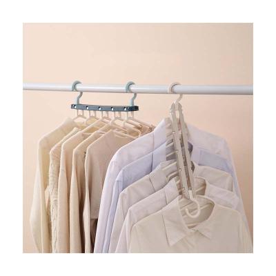 China Sustainable Space Saving Multifunctional Hanger Folding Hangers Magic Scarf Clothes Storage Drying Racks for sale