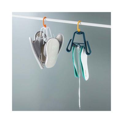 China Sustainable Plastic Shoes Hanger Drying Flip Flop Sandals Holder Slippers Hanger Stand Rack For Supermarket for sale