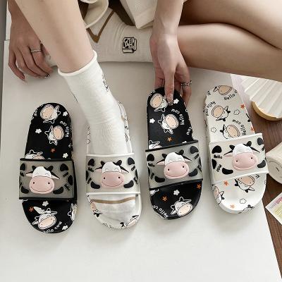 China Fashion Trend Summer Cool Waterproof Comfort Non Slip Flat Soft Unique Cartoon Cute Cow Printing Women Slide Slippers PVC Home Slippers for sale