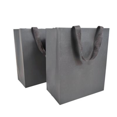 China Manufacturers Recyclable Paper Bag Custom Logo Printed Kraft Paper Shopping Bag With Handles for sale