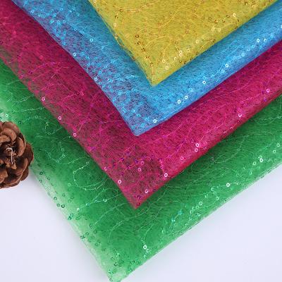 China Best Selling 3mm Multicolor Glitter Embroidery Mesh Fabric Lightweight Shiny Dress Polyester Sequin Fabric Tear-resistant Sequin Fabric for sale