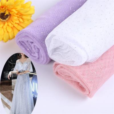 China Wholesale Anti-Static Shinny Soft Foil 100% Polyester Crystal Warp Bridal Solid Knitting Mesh Sheer Foil Fabric for sale