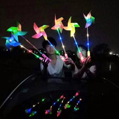 China Party Accessories 2022 Led colorful flash windmill toy luminous classic children outdoor toys wholesale for sale