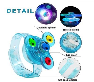 China Flashing Led Toys Birthday Party Kids Gift Different Styles Fidget Spinner Rotation Flash Luminous Rings Wristband Light Up Toys for sale