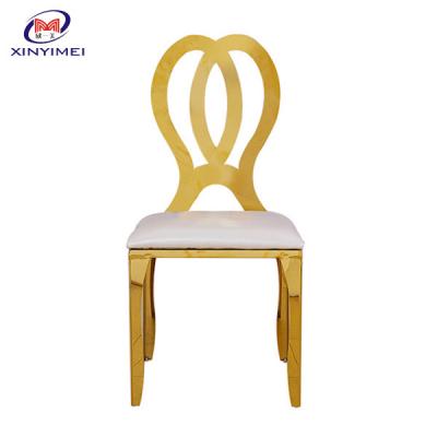 China Modern Stackable Rose Gold Stainless Steel Baroque Banquet Chair for sale