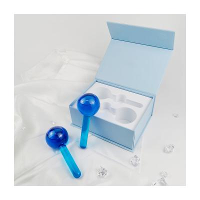 China Dongguan factory box private label custom brand beauty of blood vessel removal cooling cryotherapy facial glass massager ice globes for sale