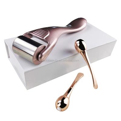 China Eye Massage Tools Eye Cream Stick Spoon Wand Roller Applicator Zinc Alloy Eye Massager Tool for sale