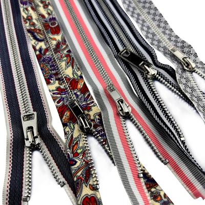 China Wholesale Viable Luxury Fancy Resin Band Metal Sprocket Roll Nylon Metal Pull Zipper Pull for sale