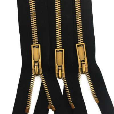 China 2022 Custom Shiny Teeth Fashion Metal Zipper Open End Gold Zipper Long Sleeve Brass Jacket Pants Clothes Zipper for sale