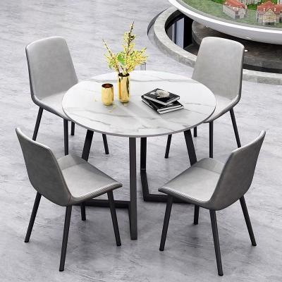 China Rectangle Modern Ceramic Top White Dining Table With 4 Chairs Carbon Steel Base 4 Person Dining Table for sale