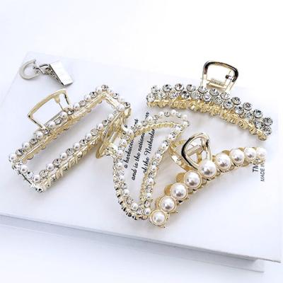 China Girls Hair Decoration New Product Ideas Hair Clips 2021 For Women Claw Hair Clips Non Slip Claws Diamond Pearl Hair Claw for sale