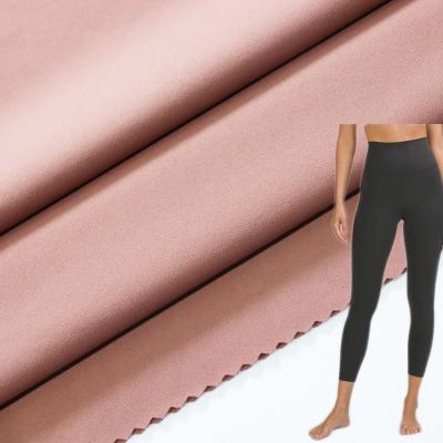 China Soft Stretch Hand Feeling Nylon Spandex 220gsm Interlock Dress Fabric Wholesale for sale