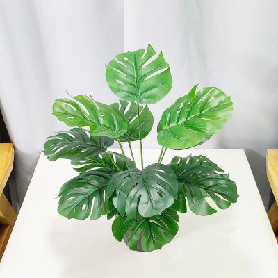 China High Quality Indoor Tropical Green Leaf Artificial Palm Monstera Decor Softness Fake Plant Leaves With Stems for sale