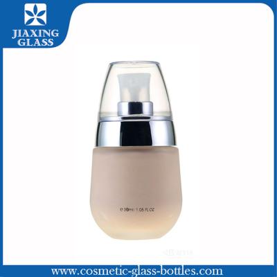 China Egg Shape Cosmetic Glass Bottle Packaging 30ml 1oz Foundation Container for sale