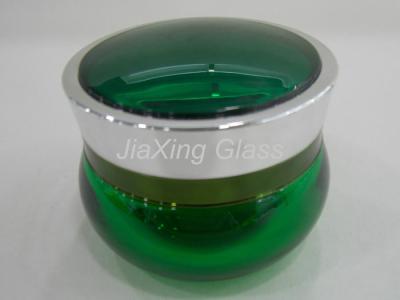 China Dark Green Empty Glass Cosmetic Jars 80g Round Shape Jars For Ladies for sale