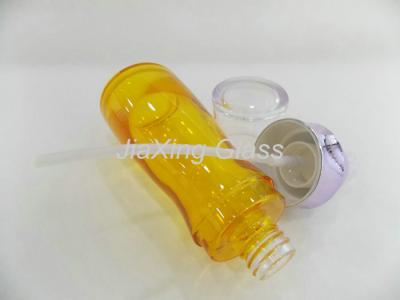 China Yellow Color Coated Glass Lotion Bottle 45ml 100ml With Plastic Pump And Cap for sale