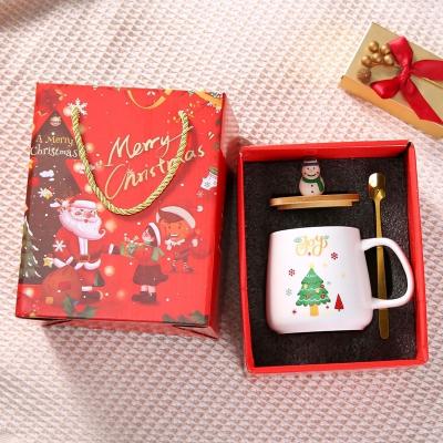 China Christmas Gift Reusable 400ml Porcelain Coffee Cup with Spoon and Santa Decoration for sale