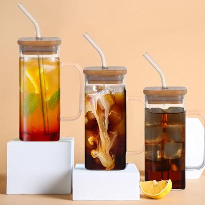 China Sustainable 350ml Clear Glassware Drinkware Iced Coffee Tea Mug with Lid and Straw Handle for sale