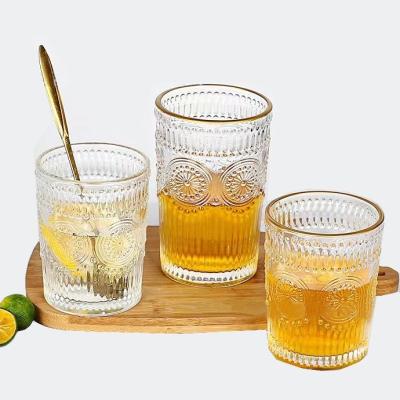 China Transparent Gold Rim Sunflower Glass Water Cup 300ML/380ML Straight Retro Embossed Mug for sale