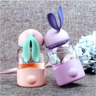 China Boiling Water Applicable 340ML Water Bottle with Cartoon Rabbit Design and Silicon Sleeve for sale