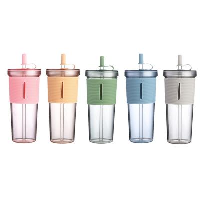 China Stocked Plastic Tumbler Reusable Cups 700ML Coffee Mugs Water Tumbler With Lid And Straw for sale