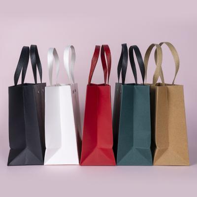 China Recyclable Custom Shopping Kraft Paper Bag Gift Custom Shopping Paper Bags With Ribbon Handles for sale