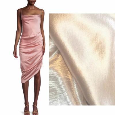 China Flame Retardant Hot Selling Satin Soft Shiny Liquid Looking Liquid Satin Hand Feeling Silky Satin Dress Fabric for sale