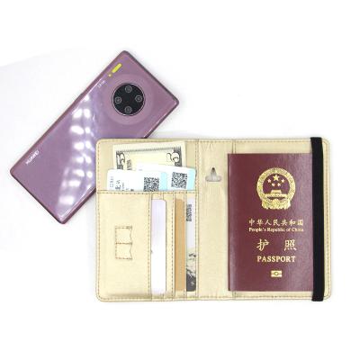 China NATIONAL RFID Passport Holder With Elastic Band Travel Wallet Custom Logo Embossed PU Leather USA Passport Cover for sale