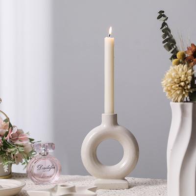 China Modern Unique Art Wholesales Ceramic Burning Ornament Nordic Candle Holder Candlestick Display Wedding Party Candlestick Holder for sale